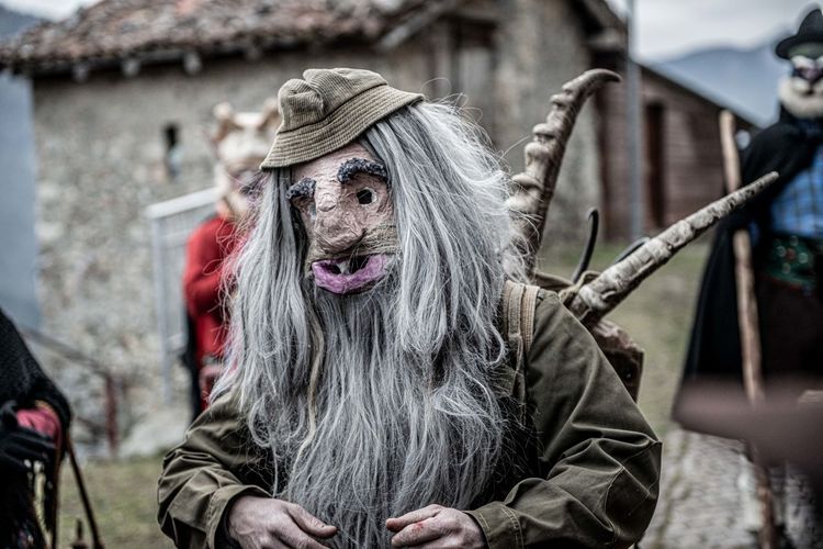 Dossena bergamo italy february gathering of masks between comedy and carnival in an old village