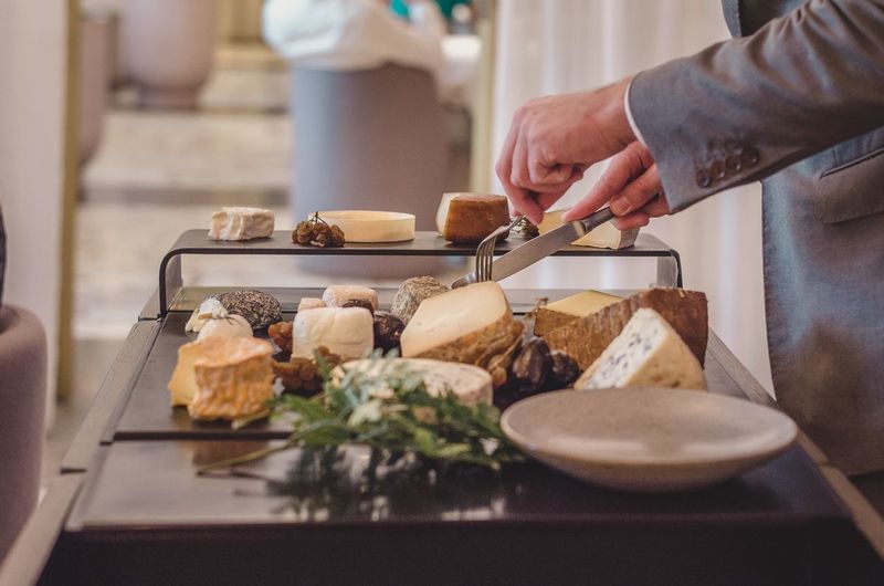 Midsection of person preparing food on table