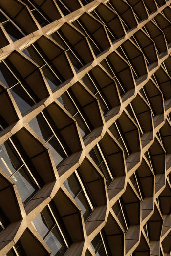 Askew modern concrete highrise exterior creating a strong pattern 