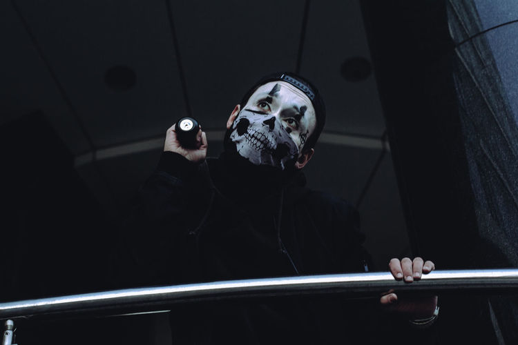 Low angle view of man with spooky make-up