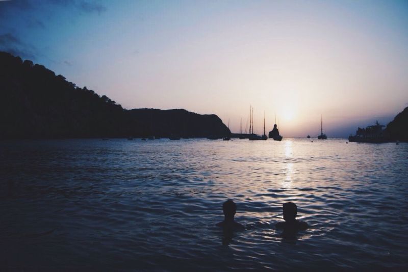 Scenic view of sunset over river