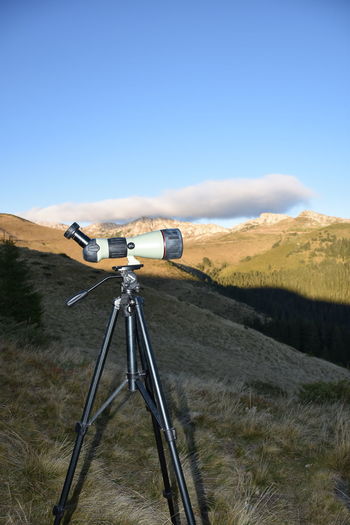 View of camera on field against sky