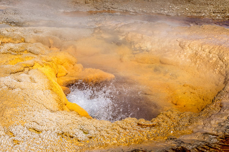 Close up of the boiling water of the pump geyser, yellowstone