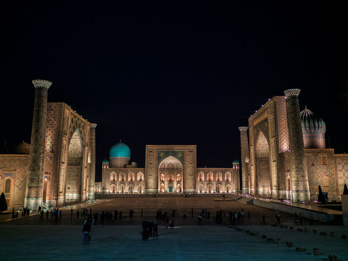 Registan square against sky at night