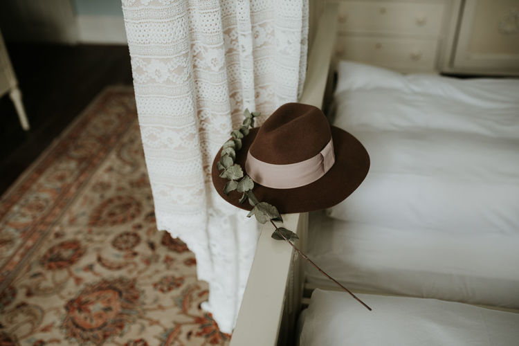 High angle view of hat on bed at home