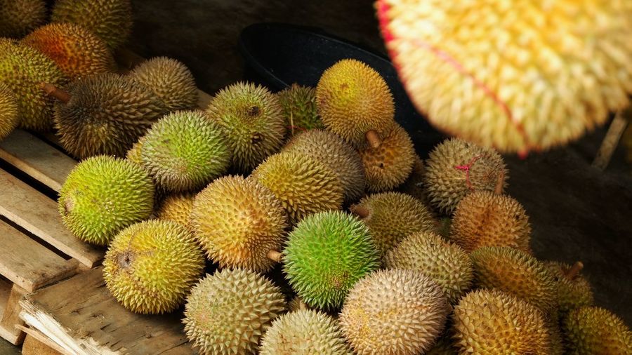 Close-up of durian fruit for sale in market