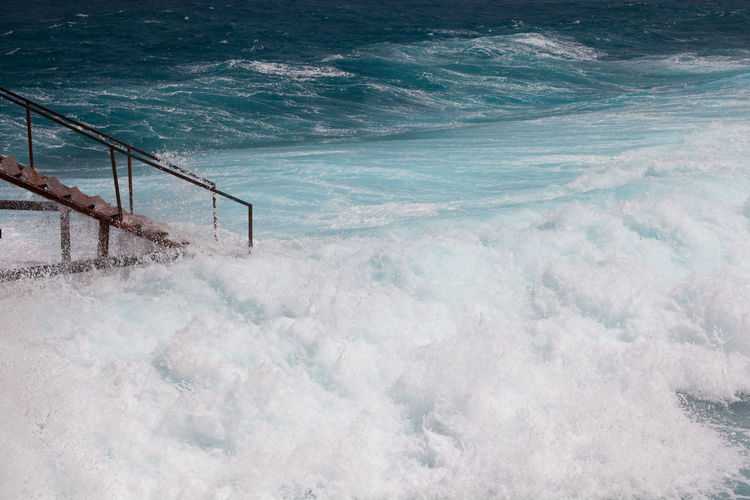 High angle view of swimming pool by sea