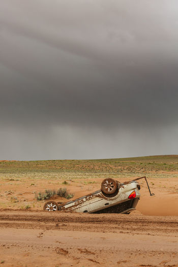 Flipped upside down subaru outback off road near moab utah