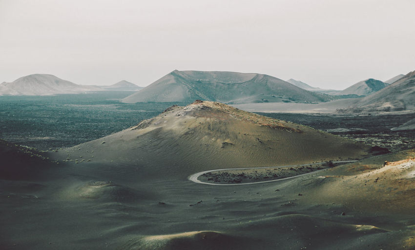 Idyllic shot of landscape at timanfaya national park against clear sky