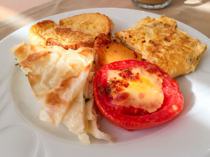 Grilled roasted potato wedges cheese melt with lasagna and toasted bread