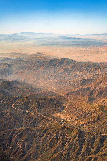 High angle view of dramatic landscape against sky