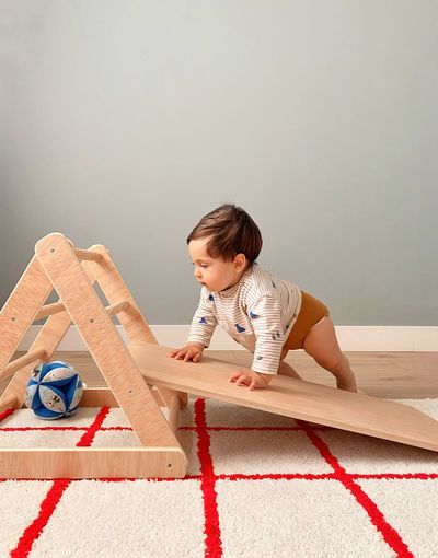 Baby playing and discovering. montessori education 