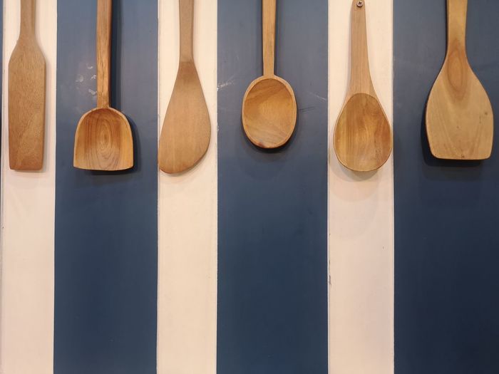Close-up of spoons on table
