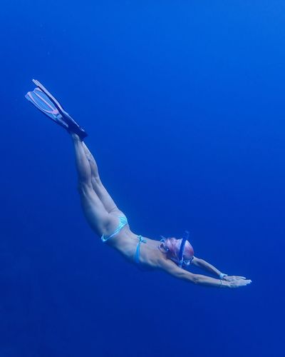 Full length of woman swimming in sea