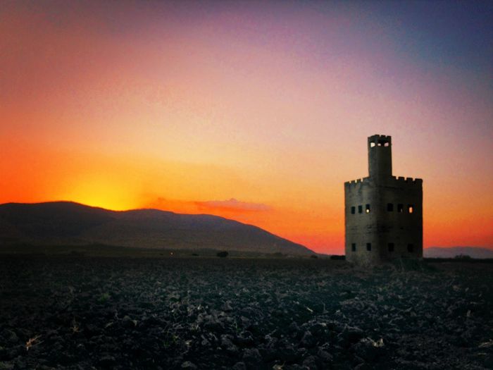 Scenic view of landscape at sunset