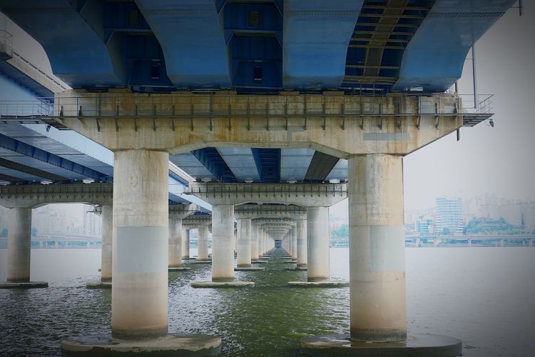 Bridge over river in city