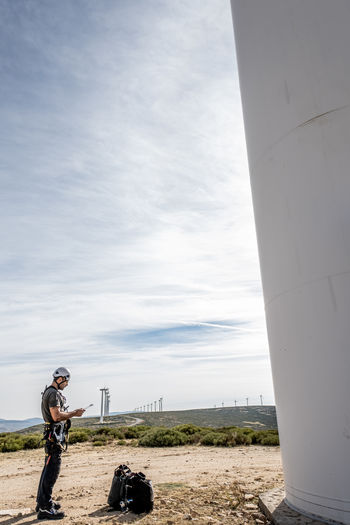 Portrait of a technician working on a wind farm