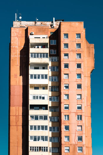 Low angle view of residential building against sky
