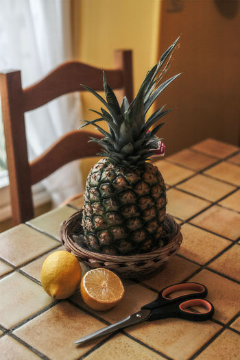 Close-up of orange fruit on table at home