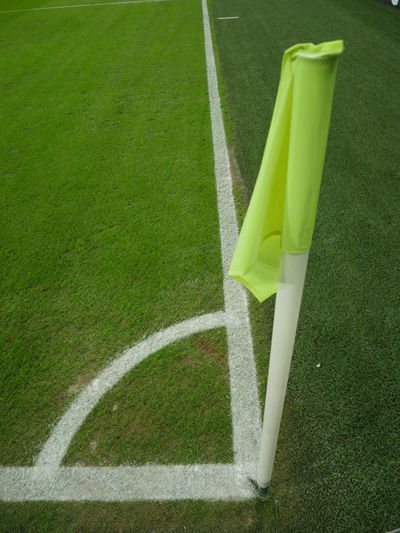 High angle view of flag at corner on soccer field