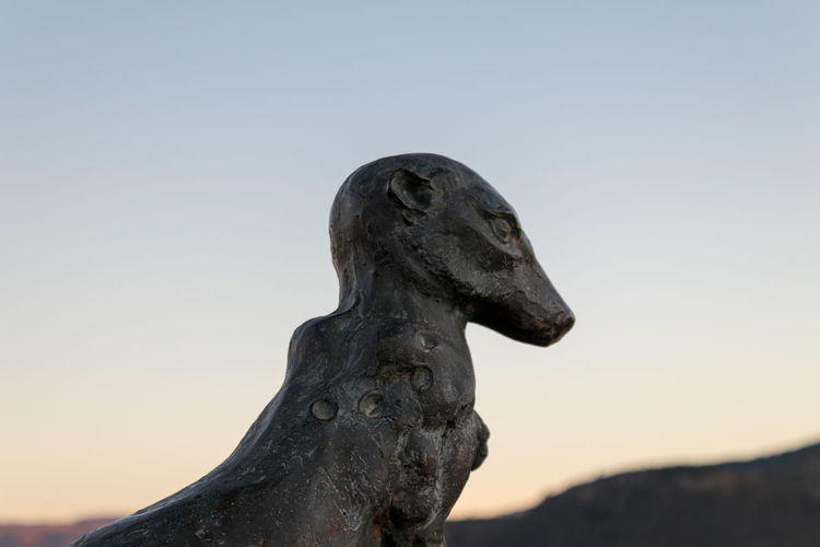 Close-up of a statue against clear sky