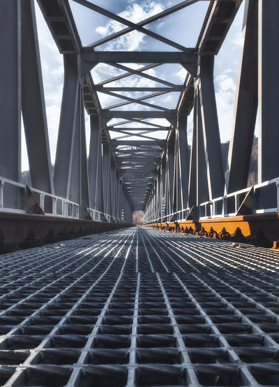 Surface level of railway bridge against sky