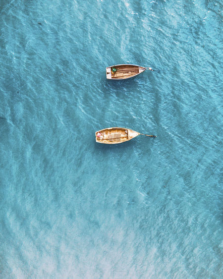 High angle view of empty boat floating on sea