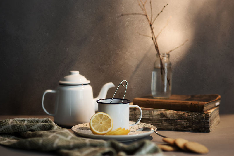 Close-up of tea kettle on table