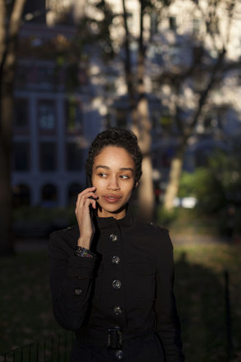 Young woman talking on her cell phone