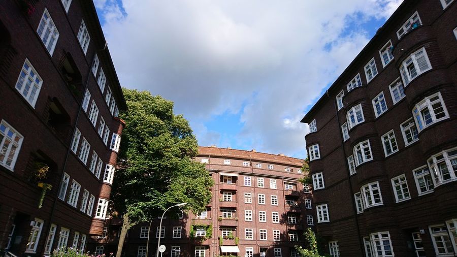 Low angle view of buildings against sky