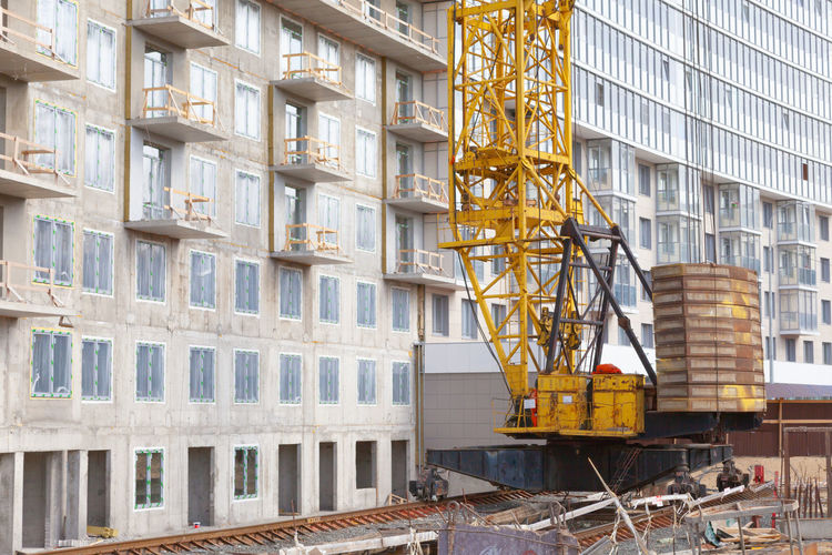 Construction site and crane building a skyscraper. modern technologies.