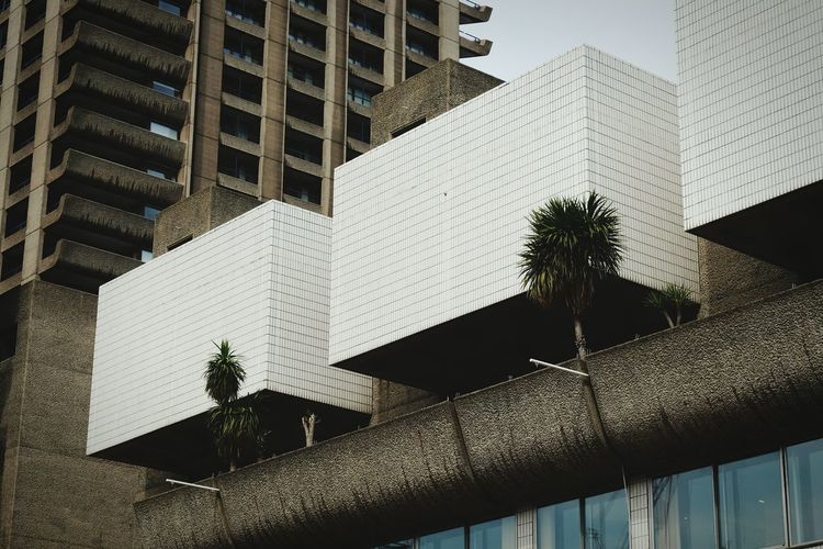 Low angle view of barbican centre in city