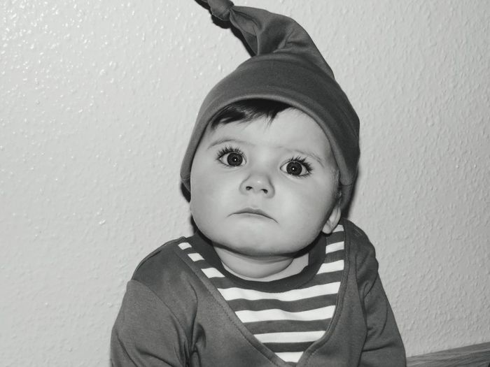 Close-up of cute baby boy in elf costume