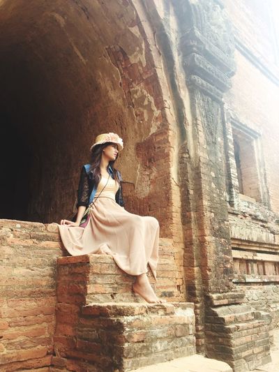 Woman at built structure