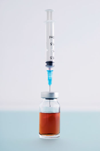 Close-up of water bottle against white background