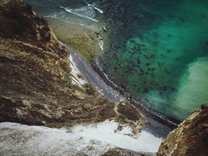 High angle view of cliff and sea