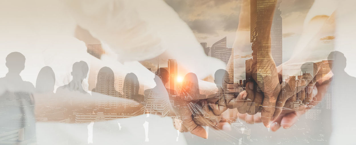 Digital composite image of man holding hands