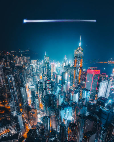 Illuminated buildings in city at night