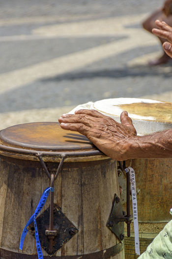 Percussionist playing atabaque during afro-brazilian  manifestation at pelourinho on salvador, bahia