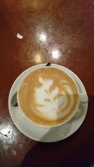 Close-up of cappuccino on table