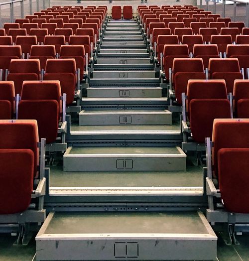 Empty chairs arranging at auditorium