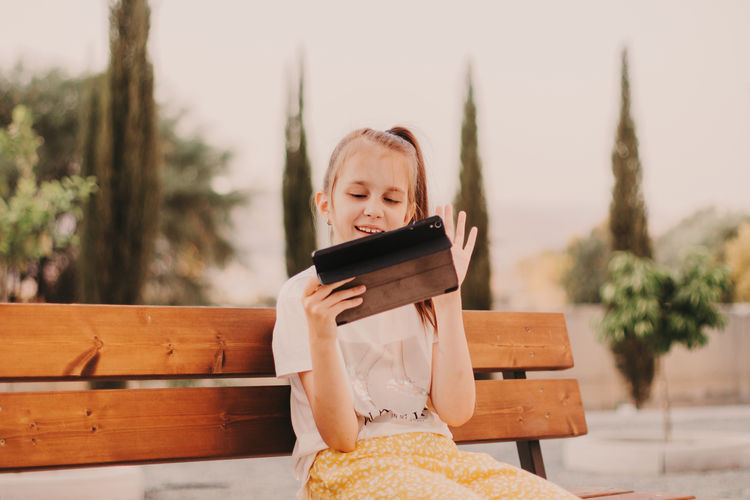 Young woman reading book