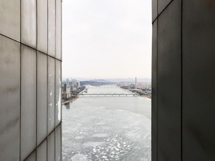 View of cityscape through window