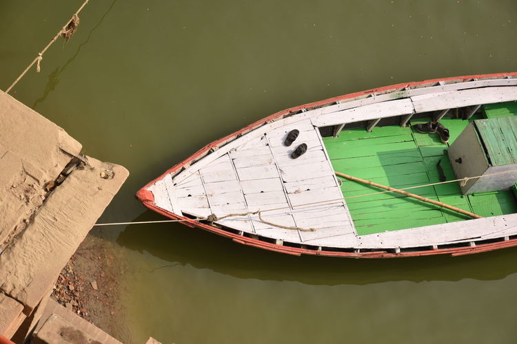 High angle view of boat moored in lake