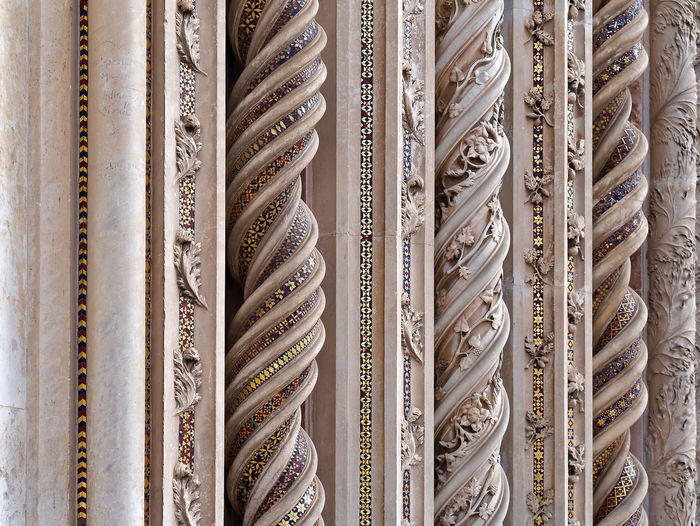 Full frame shot of carvings on columns