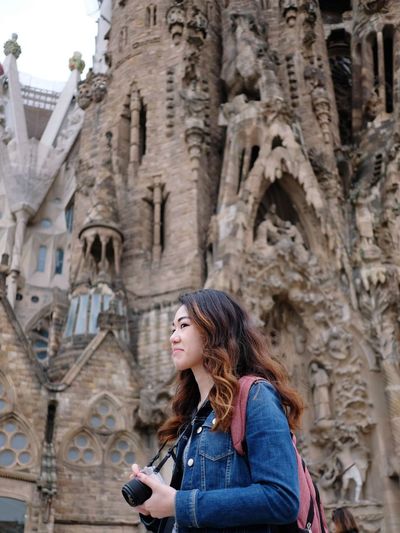 Low angle view of woman in historic building