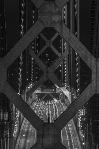 Low angle view of illuminated bridge