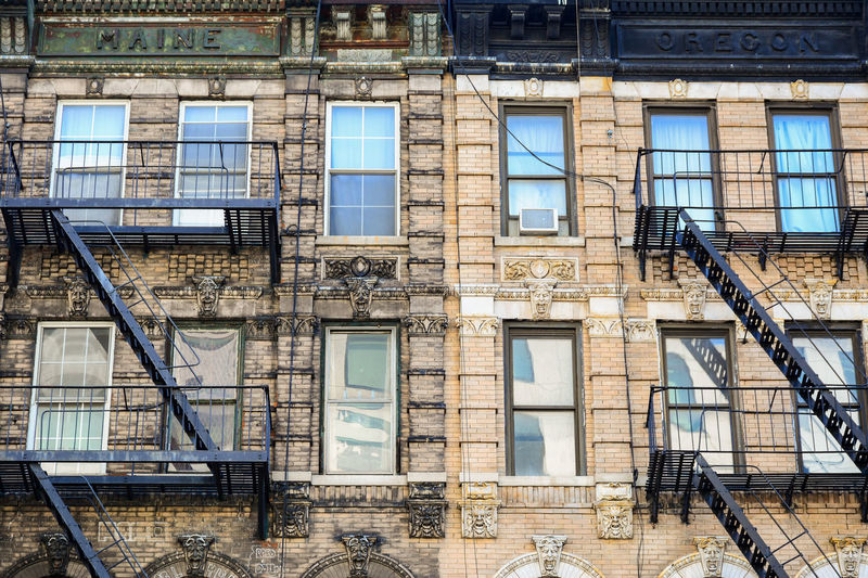 Low angle view of fire escapes on an apartment building