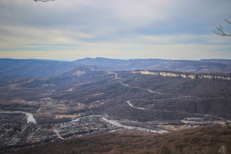 High angle view of landscape against cloudy sky