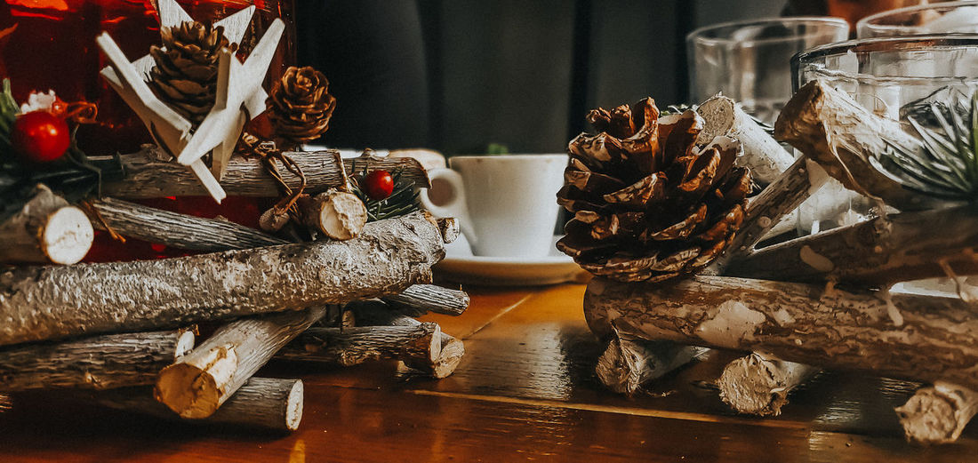 Close-up of pine cone on table